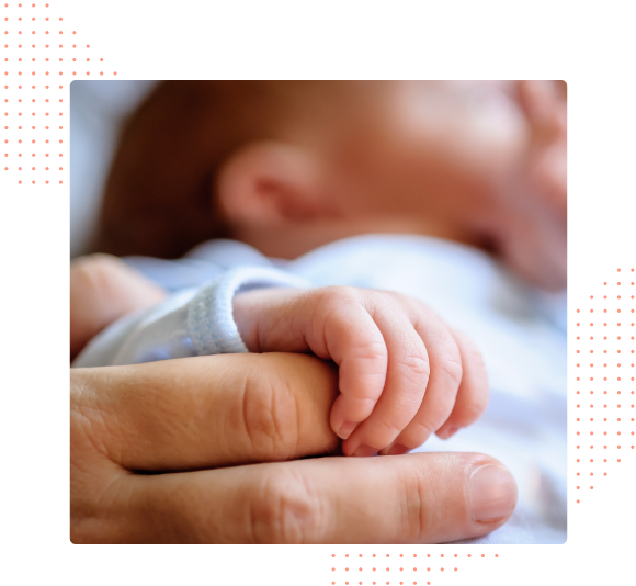 Mother and baby hand